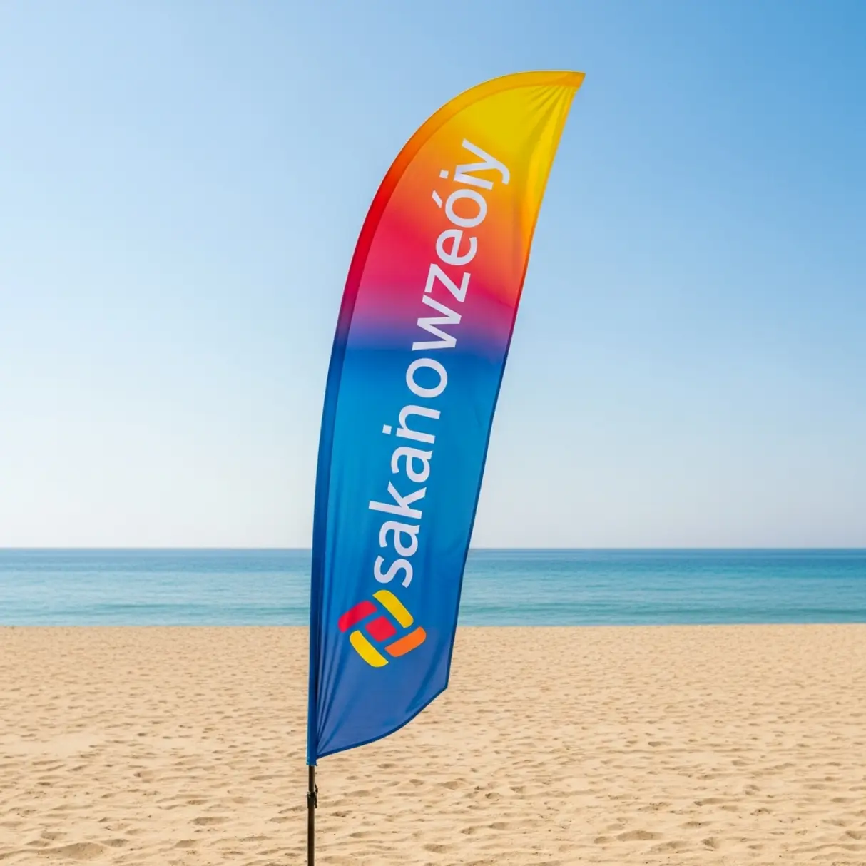 Flaga reklamowa winder na plaży z logotypem 