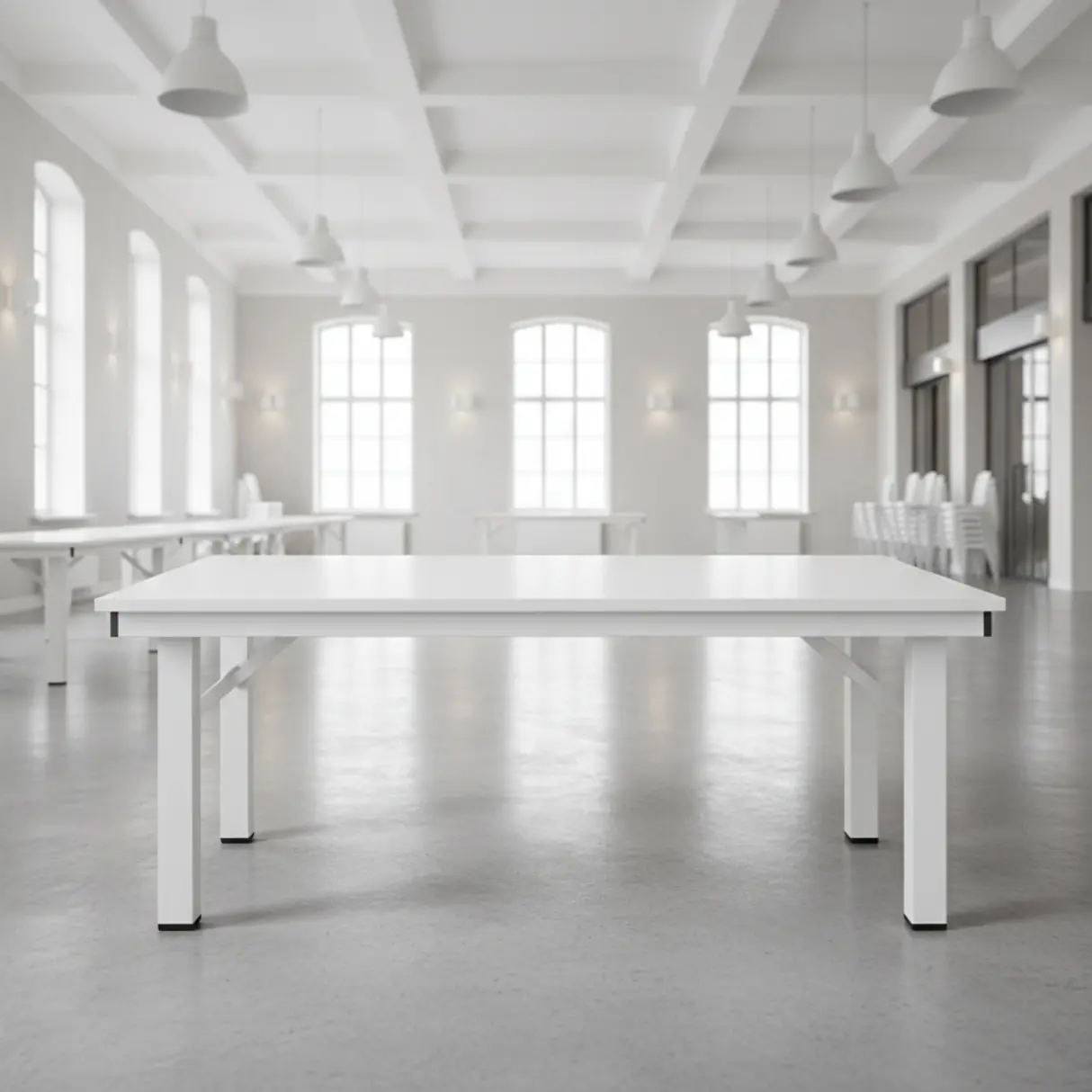 Biały stół eventowy 180x75 cm w nowoczesnej sali.